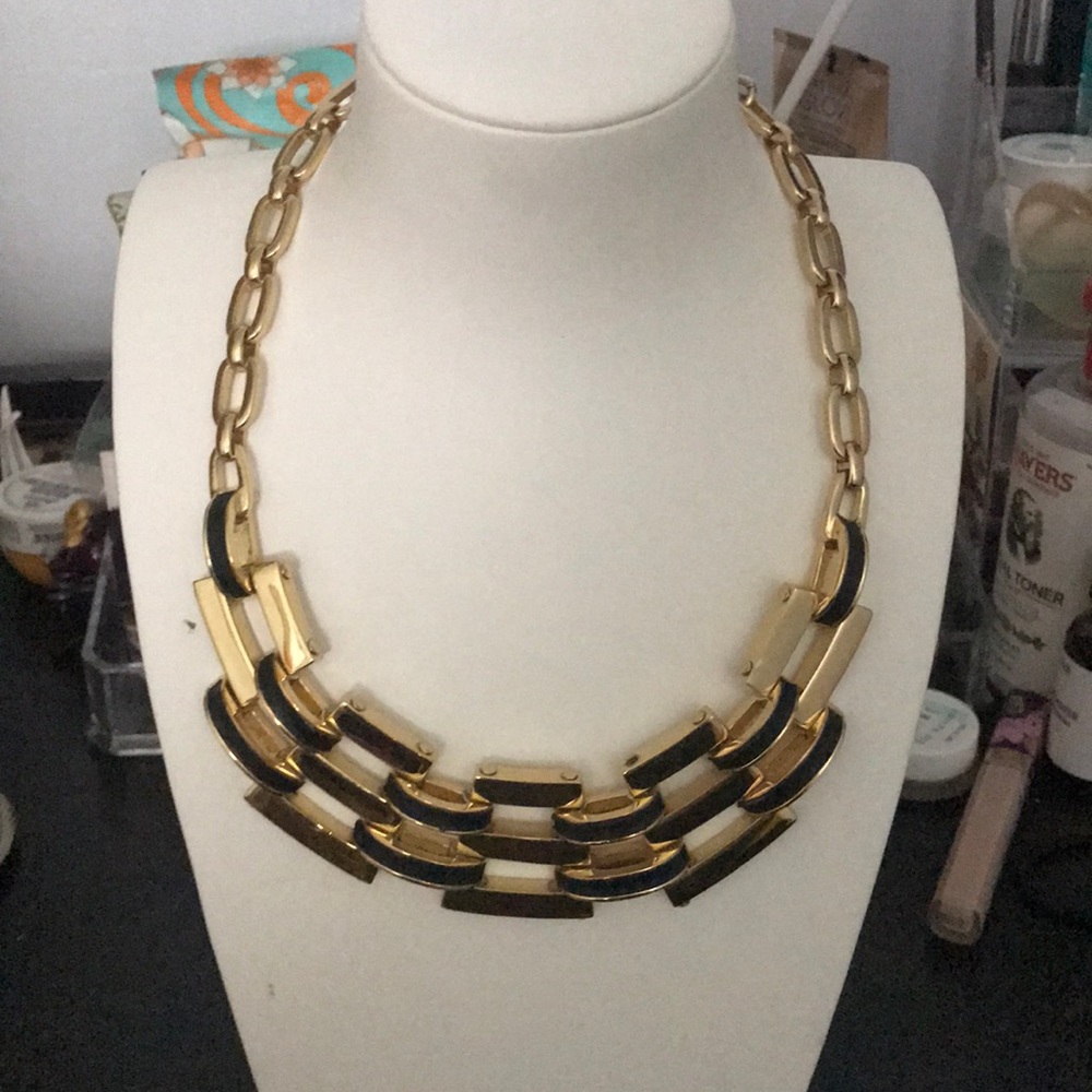C. Wonder gold and leather necklace